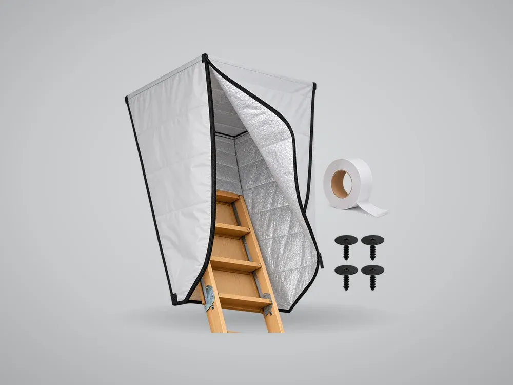 A zipped insulated tent fitted over a pull-down attic ladder, with sealing tape and clips