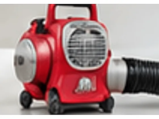 A red insulation blower machine with its wide output hose attached